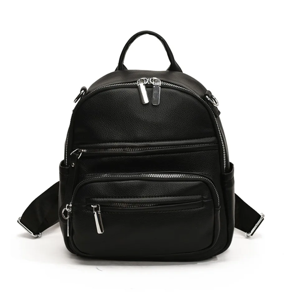 Well-organized internal compartments in a leather backpack with multiple storage sections