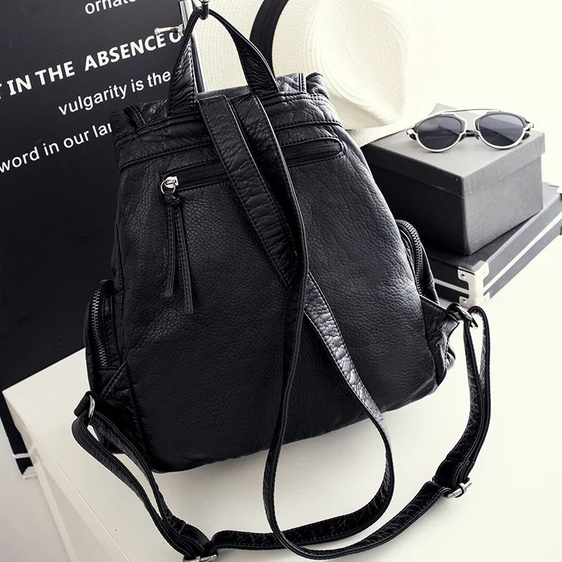 Compact leather backpack with smart organization features for women's daily essentials